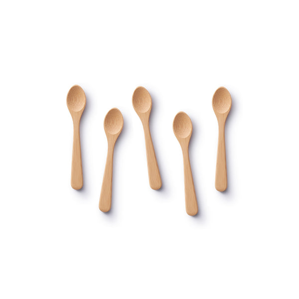 A set of five bamboo teaspoons are shown on a white background