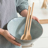 The 3 utensils included in the Mix & Taste Set are shown in a blue mixing bowl.