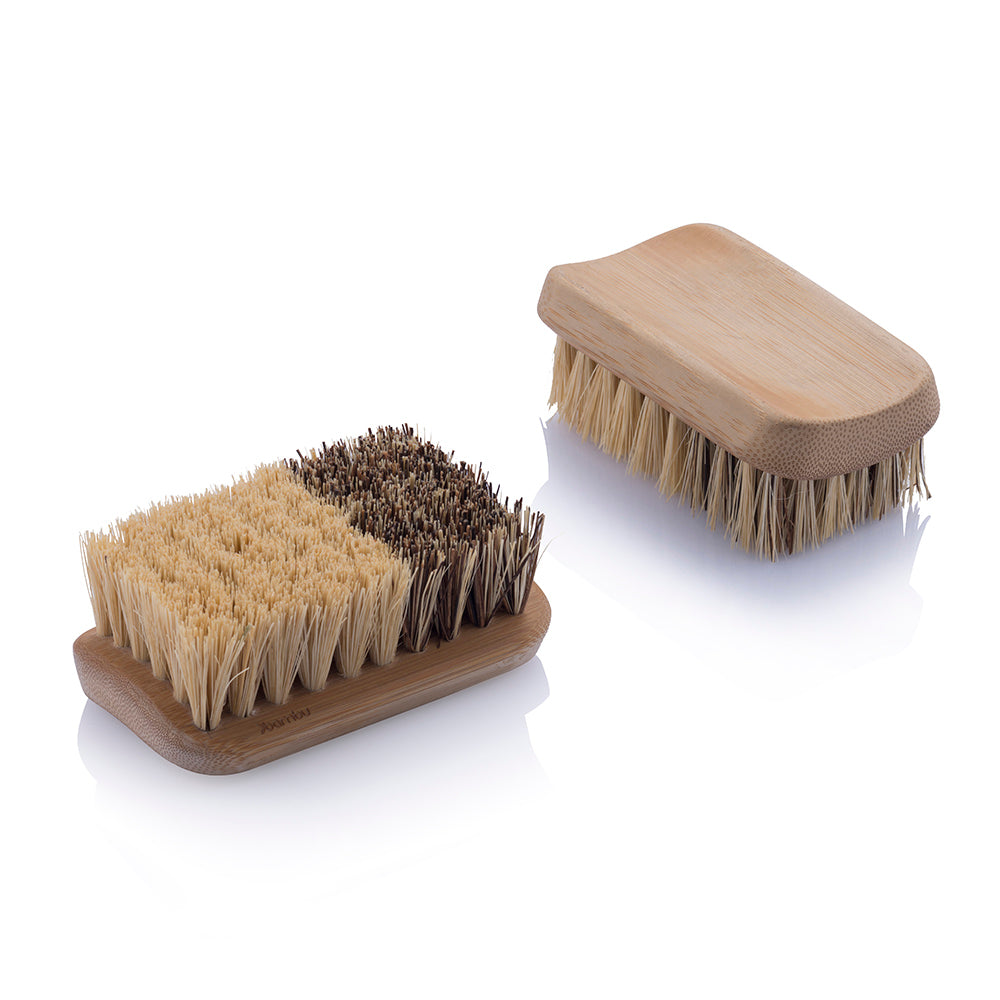 2 All Purpose Cleaning brushes are shown on a white background. One is shown bristle-up to show the mix of sisal and palmera bristles. 