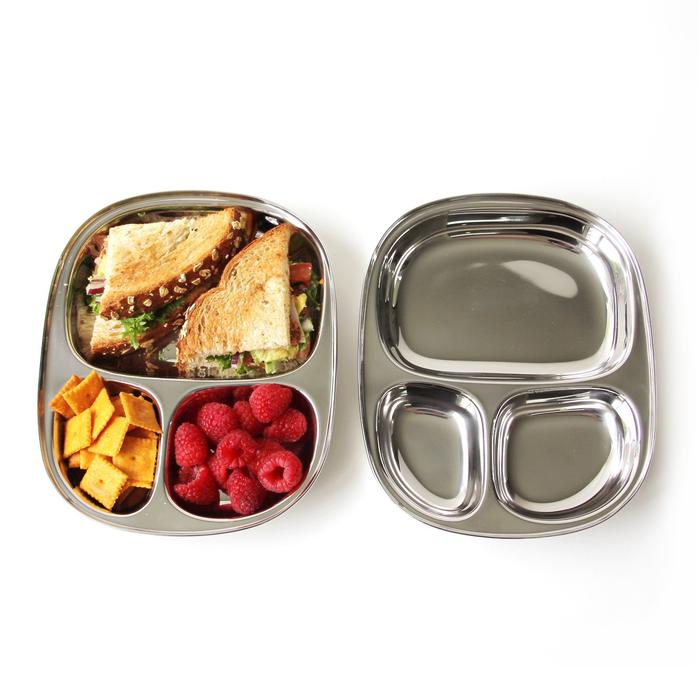 A pair of ECOLunchbox Stainless Kid's Tray is shown side by side with and without food.